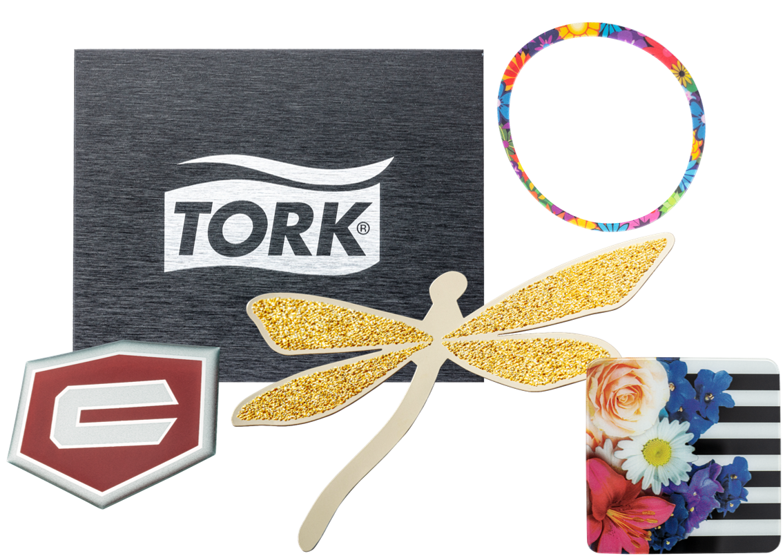 Collage of logo images. Black Tork logo brushed. Red Craftsman shield. Gold dragonfly. Floral and stripes square. Flower circle trim piece.